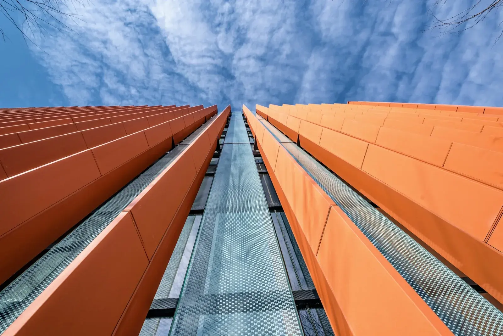 Abstract upward view of a commercial building's exterior walls