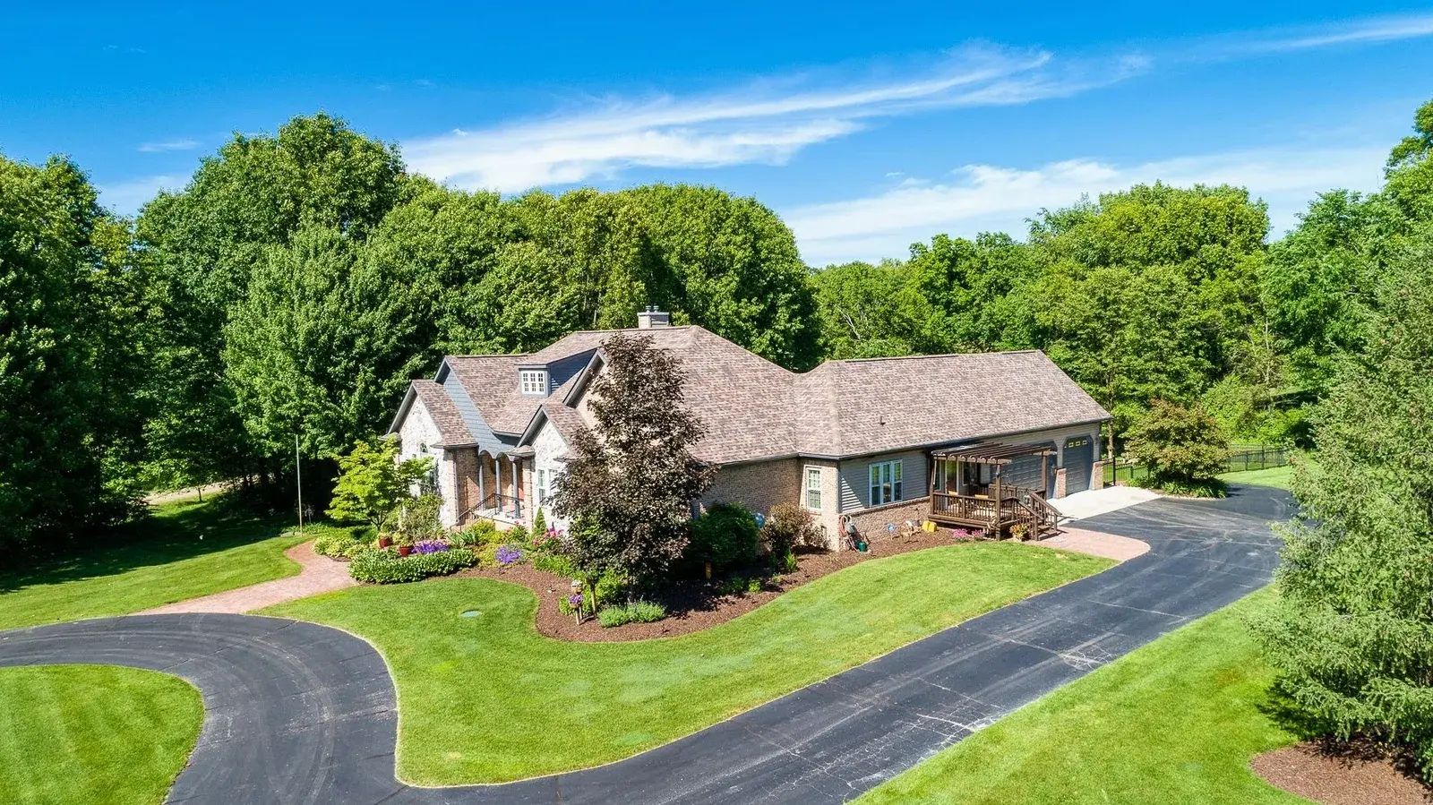 Aerial drone side view of a home
