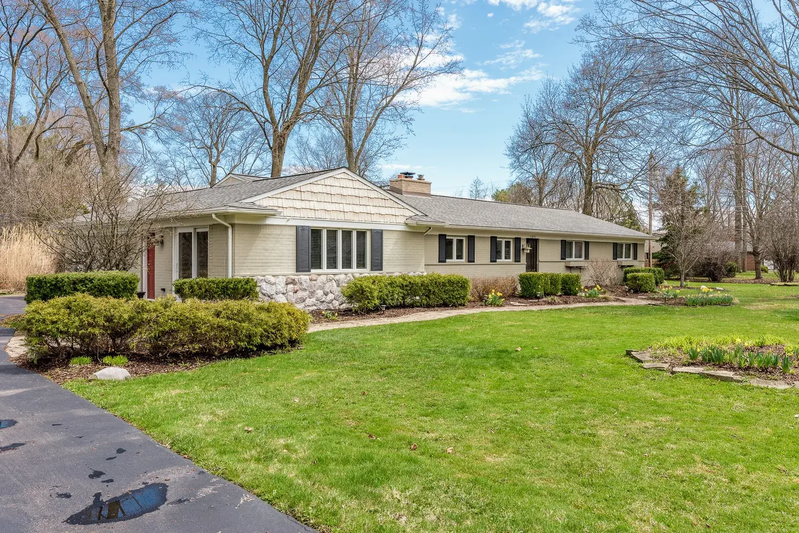 Angled front lawn view of a home