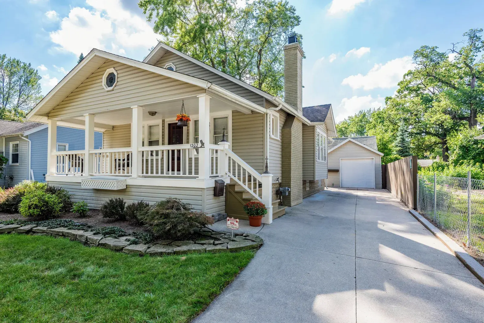 Driveway view of a small home