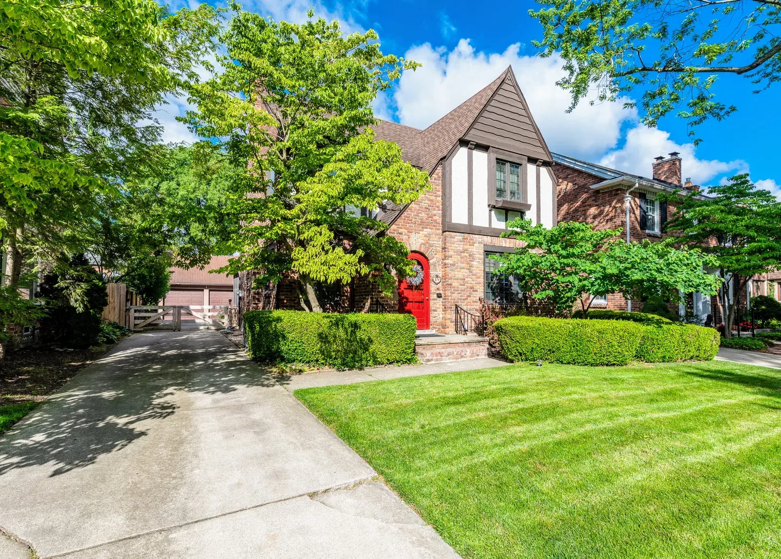 Front lawn and driveway view of a home