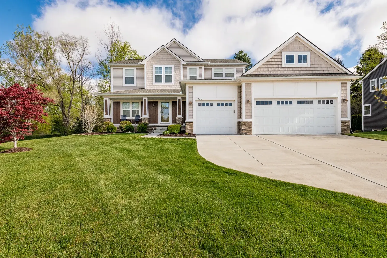 Front lawn exterior of a suburban home