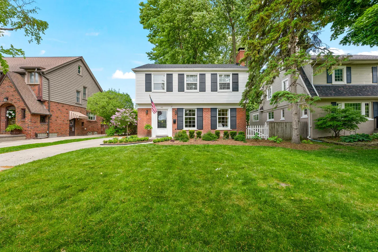 Front lawn view of a two-story suburban home
