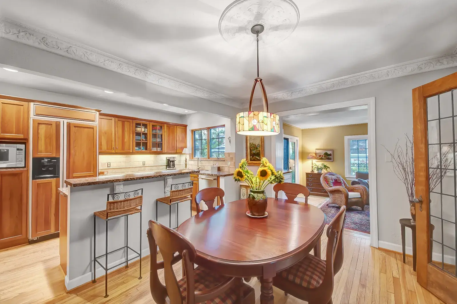 Interior view of an older-style kitchen and dining table