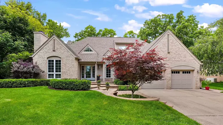 Timelapse of a home's front exterior transitioning from daylight to evening